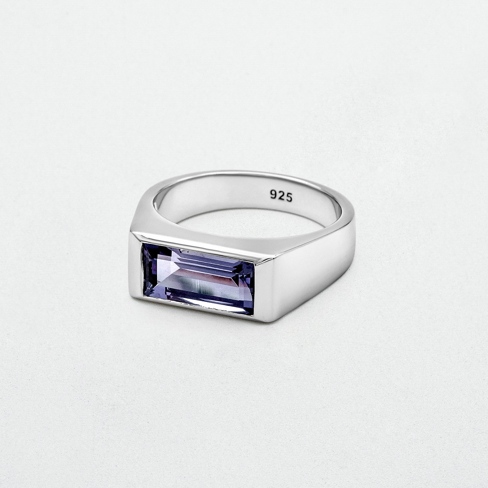 Amethyst Ring featuring a natural baguette-cut amethyst stone set in a high-polish silver rhodium-plated setting, crafted from recycled 925 sterling silver.