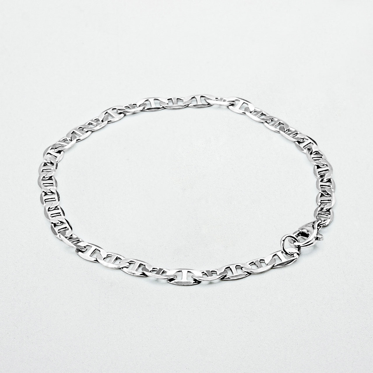 displaying silver Infinite Bracelet on a blank background