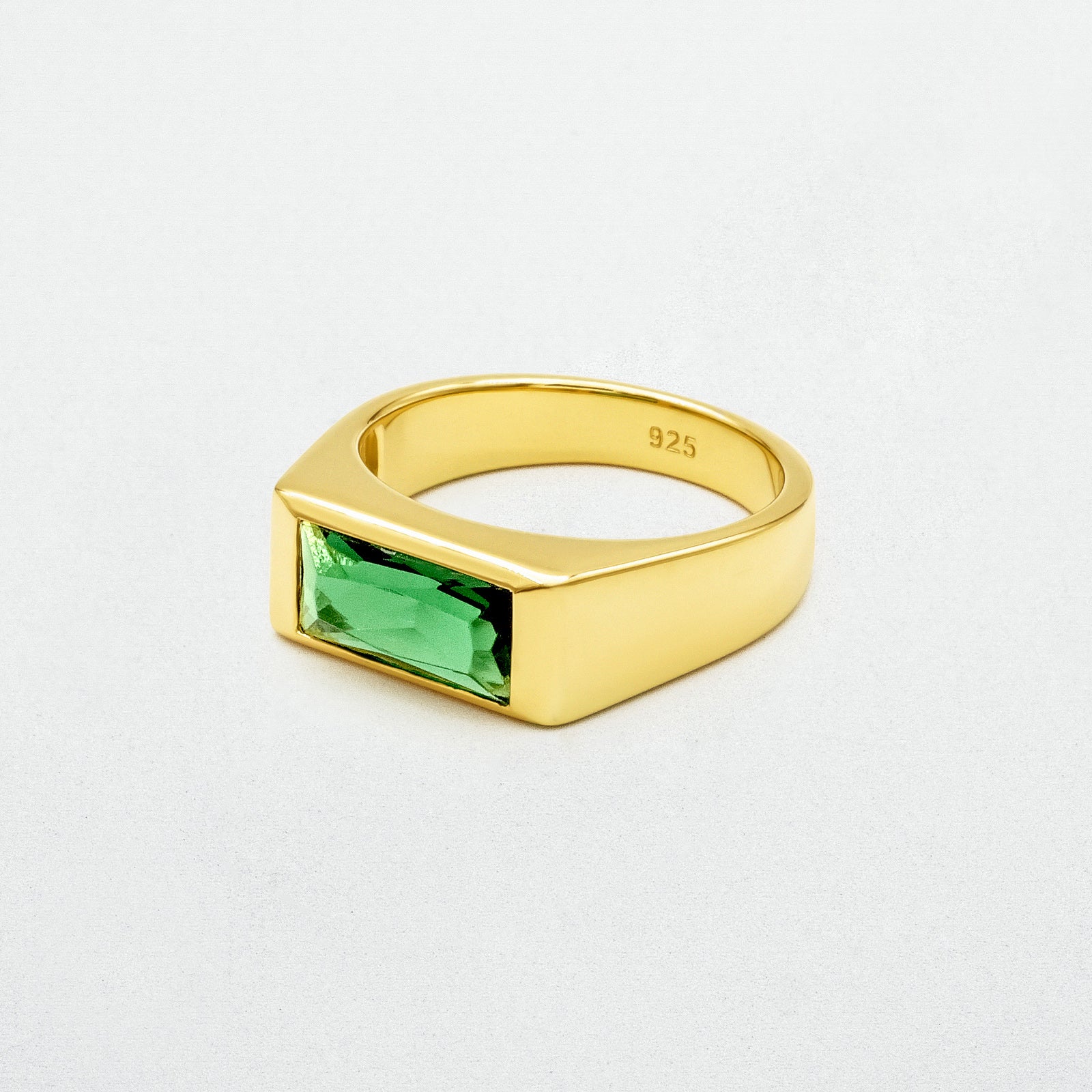 showcasing Emerald Gold Sona Ring  on a black canvas