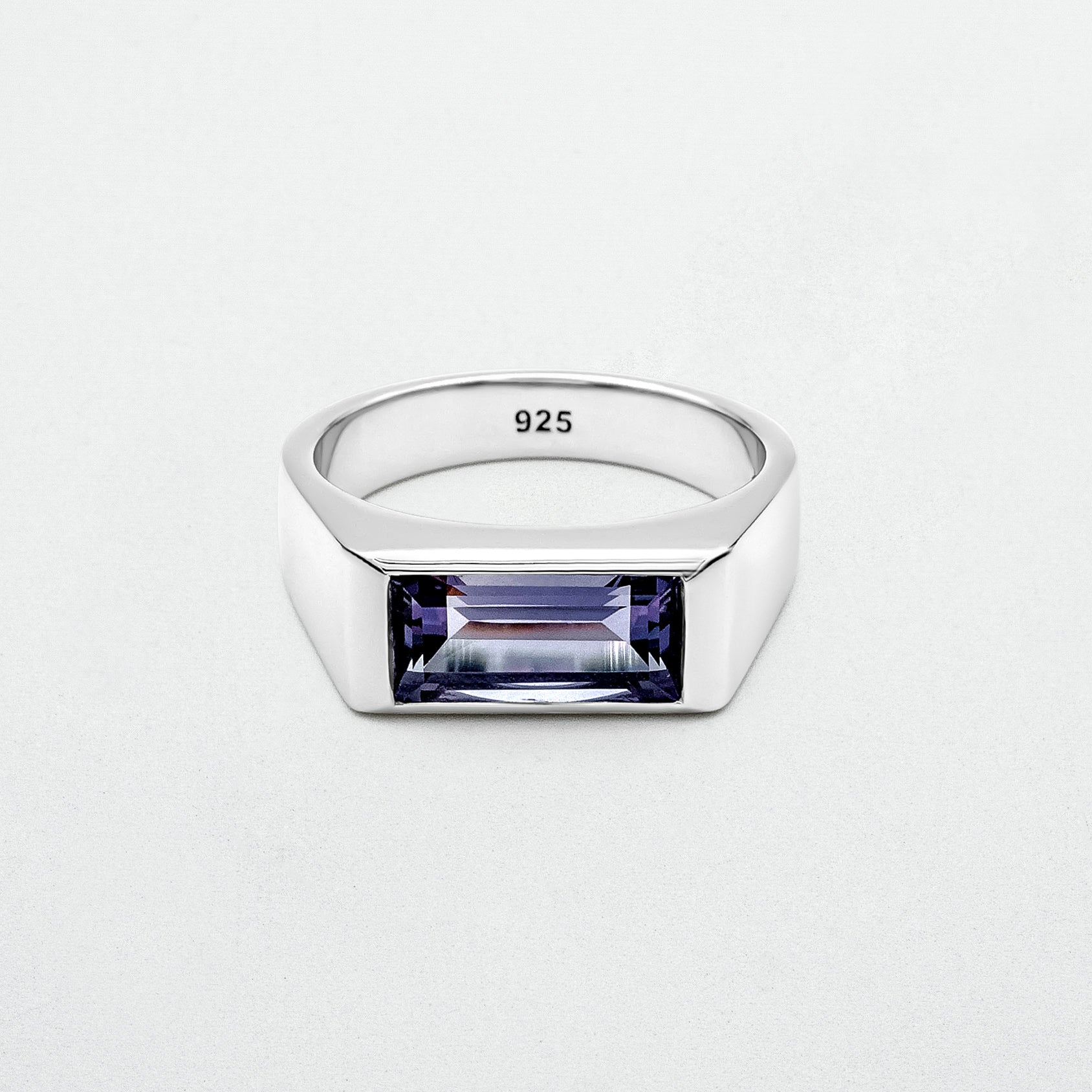 Amethyst Ring featuring a natural baguette-cut amethyst stone set in a high-polish silver rhodium-plated setting, crafted from recycled 925 sterling silver.