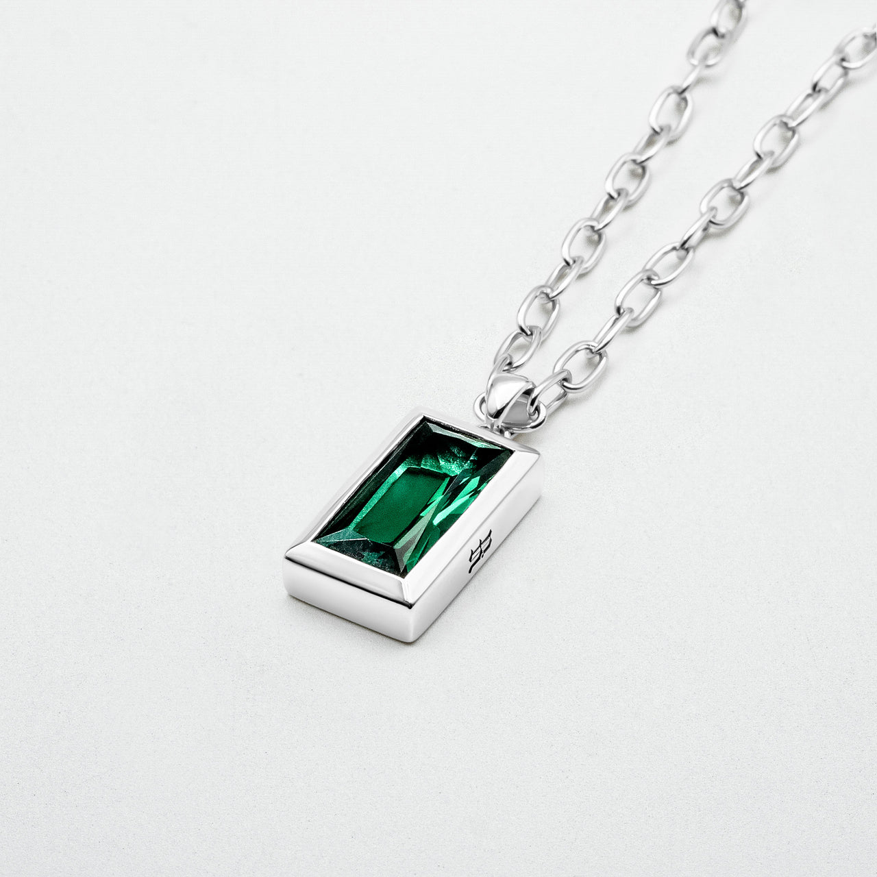 showcasing Sona Emerald Pendant on a blank canvas