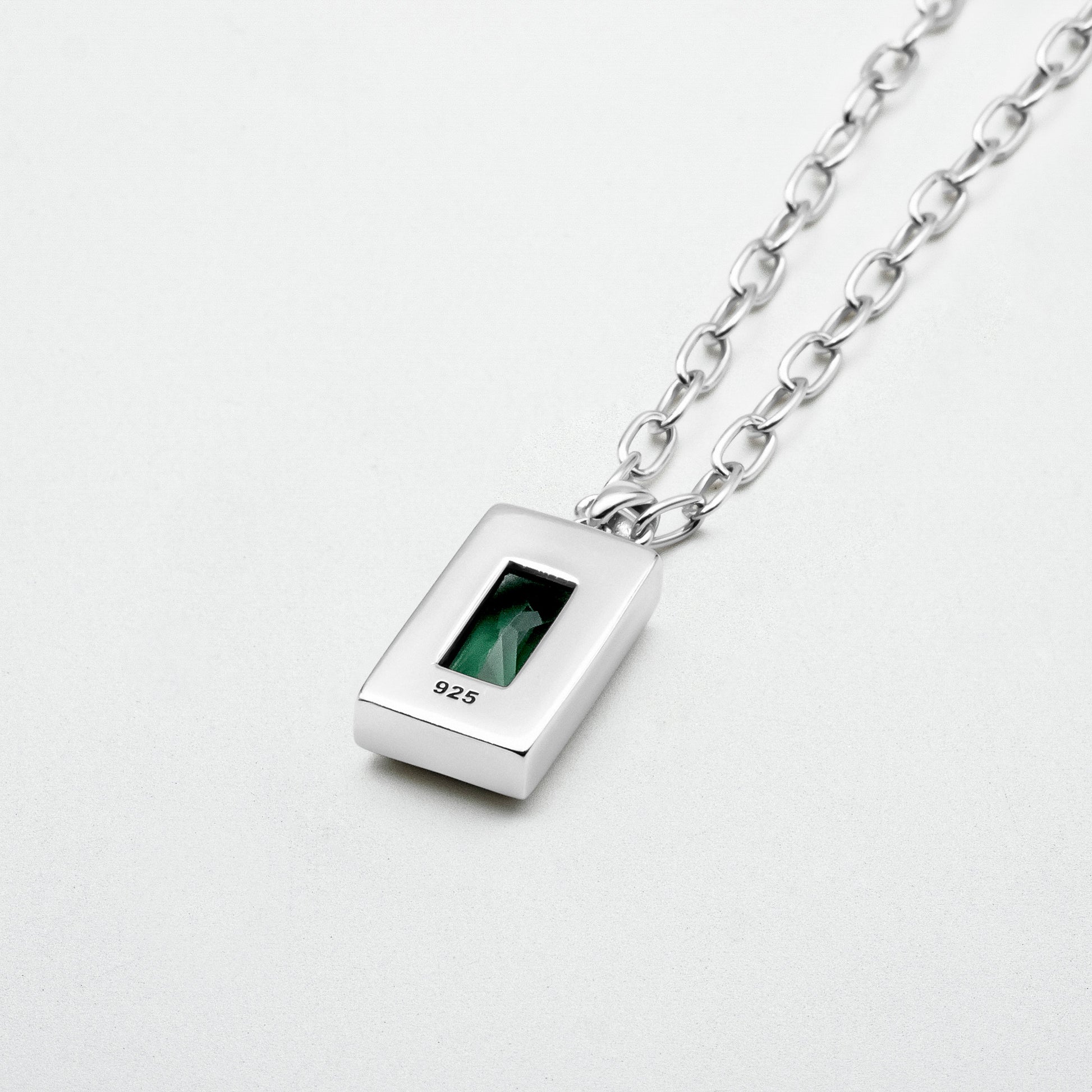 showcasing Sona Emerald Pendant on a blank canvas