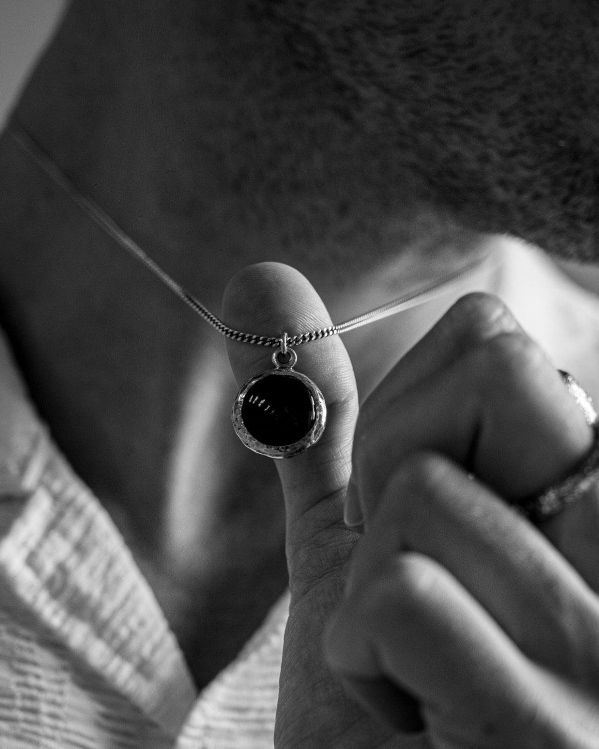 Close-up of the Black Onyx Pendant featuring genuine black onyx set in solid 925 sterling silver.