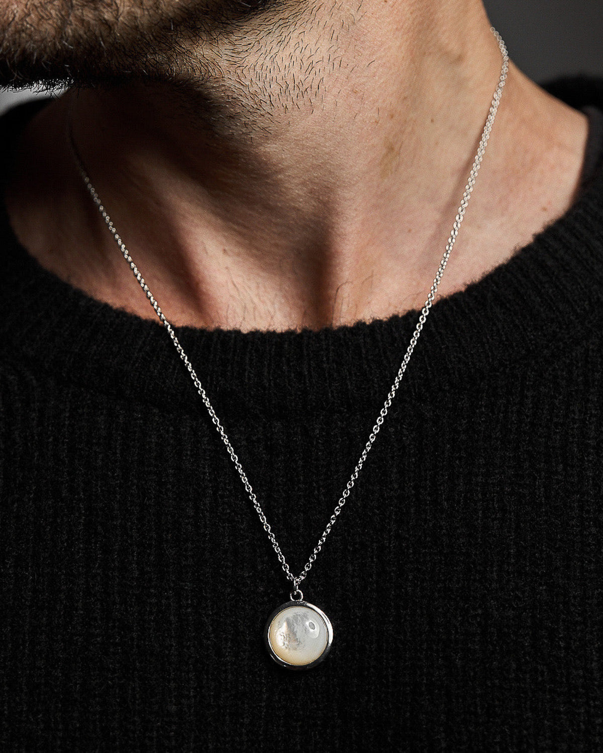 Model wearing the Mother of Pearl Pendant handcrafted from solid 925 sterling silver on a sterling silver necklace.