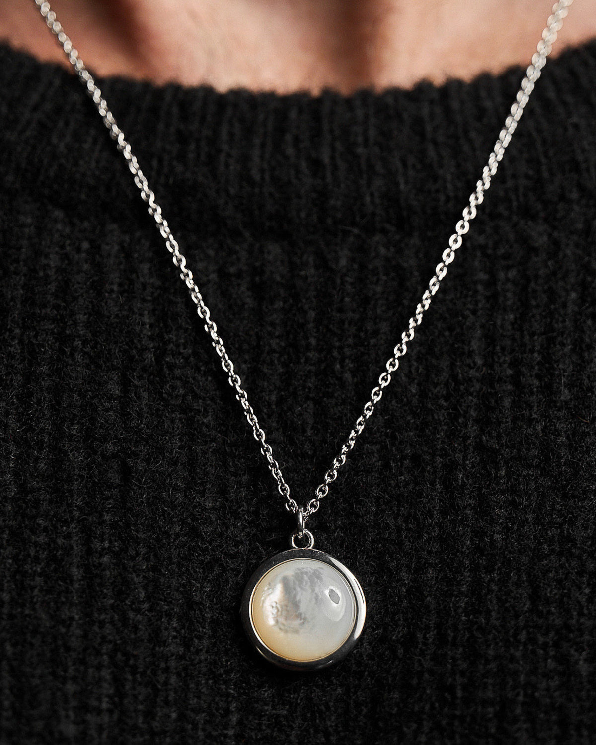 Close-up of the Mother of Pearl Pendant, featuring genuine mother-of-pearl set in solid 925 sterling silver.