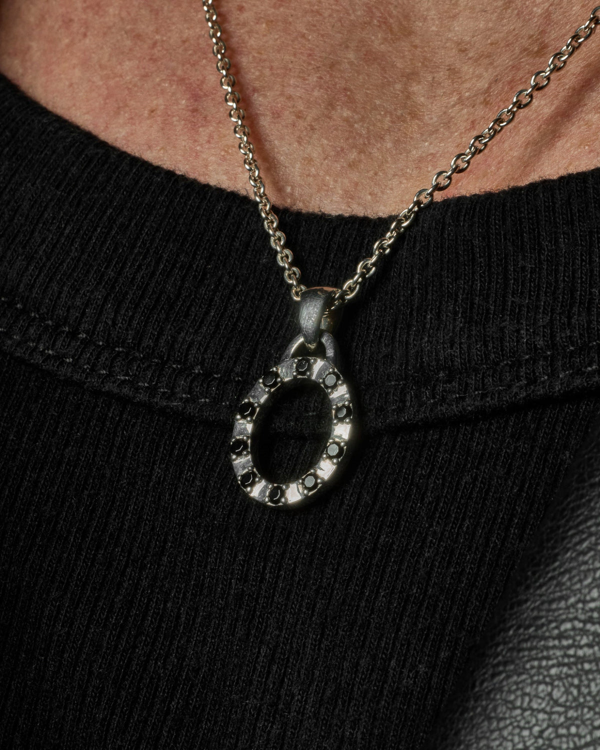 Octavia Pendant handcrafted from solid 925 sterling silver featuring black stones on a sterling silver necklace.
