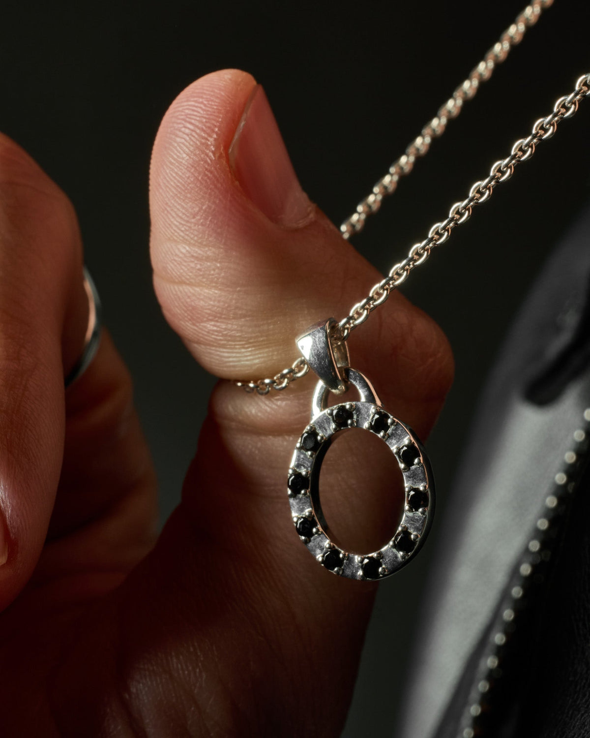 Premium sterling silver Octavia Pendant with black stone detailing.