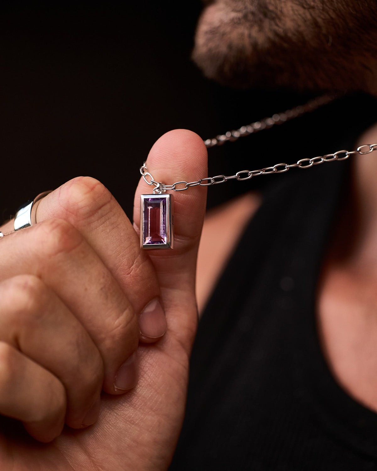 Close-up of the Sona Amethyst Pendant featuring an amethyst-coloured stone set in solid 925 sterling silver.