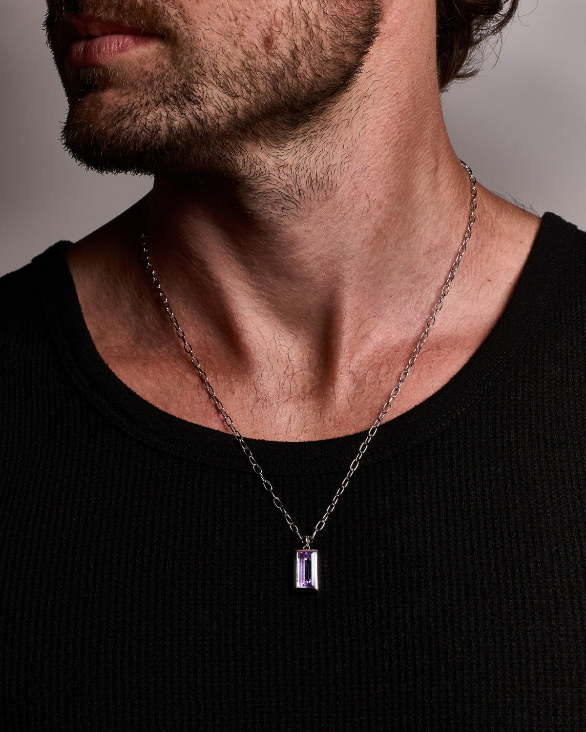 Sona Amethyst Pendant handcrafted from solid 925 sterling silver featuring an amethyst-coloured stone.