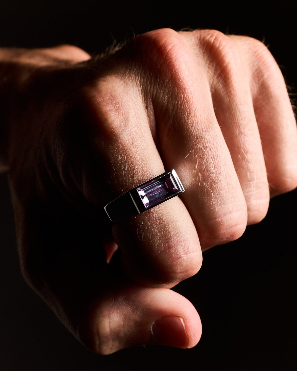Model wearing the Sona Amethyst Ring handcrafted from solid 925 sterling silver one.