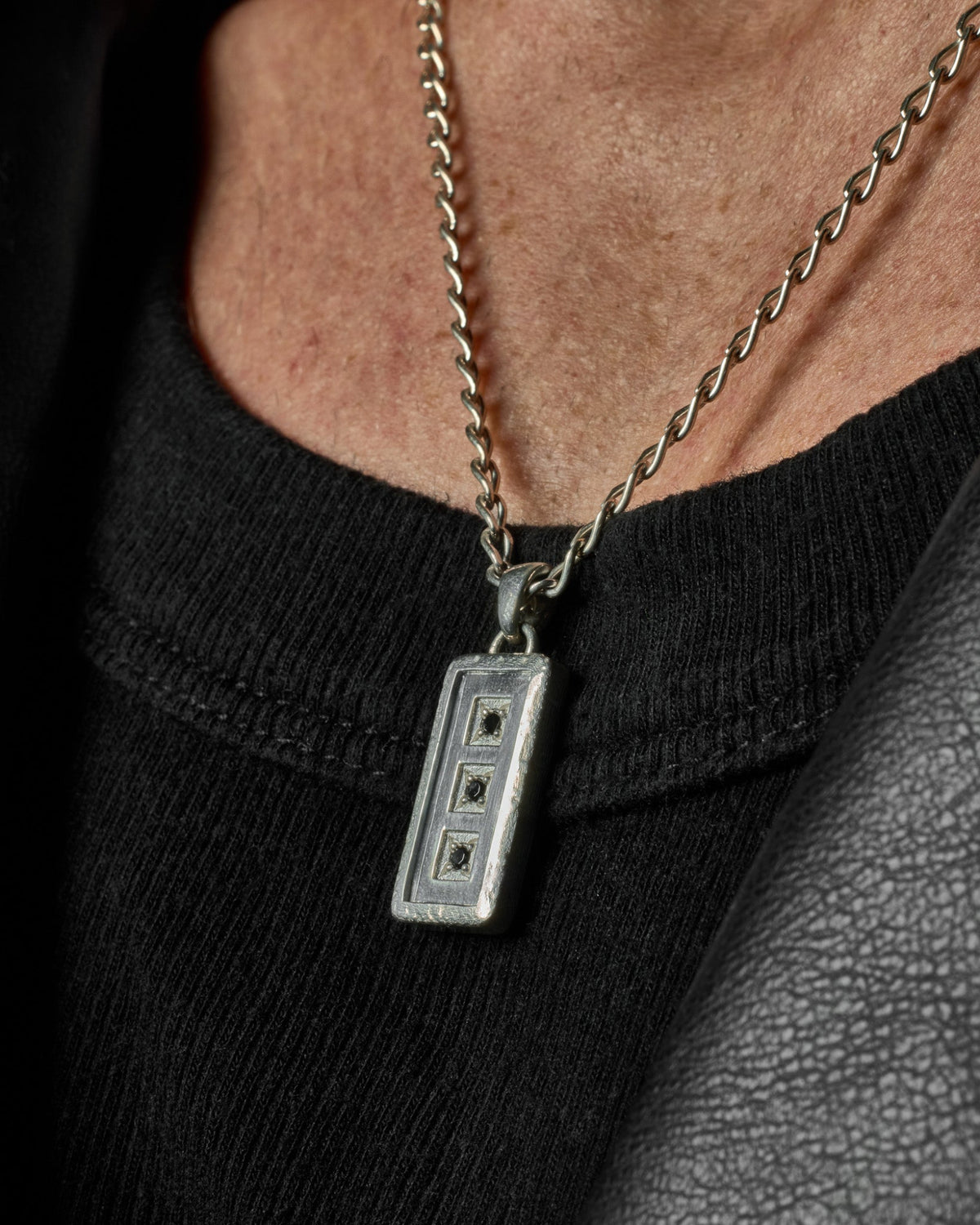 Close-up of the Trilogy Pendant featuring three stones set in solid 925 sterling silver.
