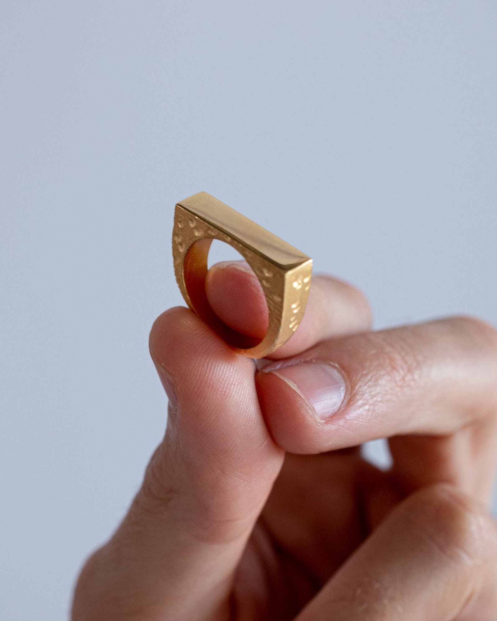 Side view of the Mickey 1.0 ring showing its textured finish